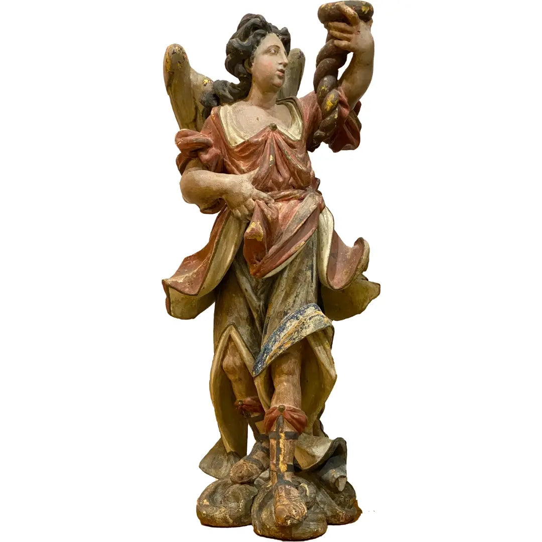 Portuguese Baroque angel sculpture from the 17th century with flowing robes and gilded details, exhibited at MacCallum More Museum & Gardens