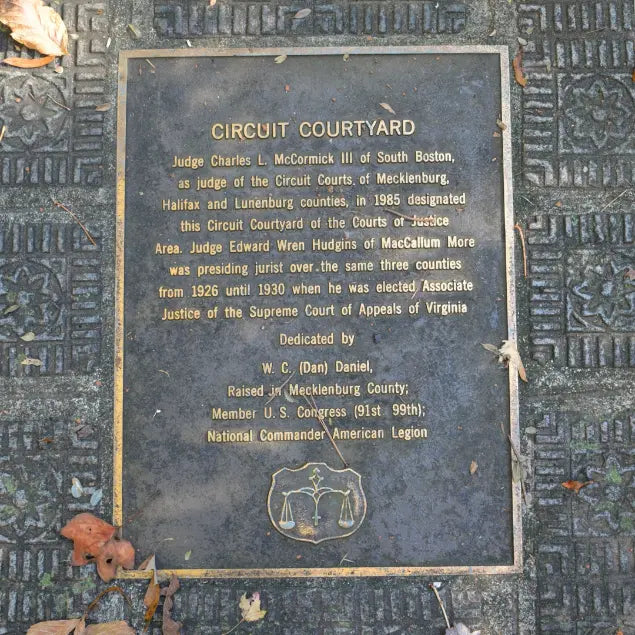 Courts of Justice commemorative plaque set into stone at MacCallum More Museum & Gardens in Chase City VA