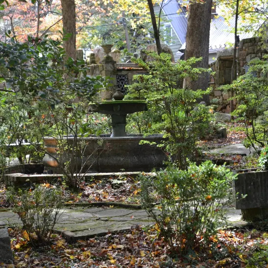Spanish-style fountain surrounded by garden pathways at MacCallum More Museum & Gardens in Chase City VA