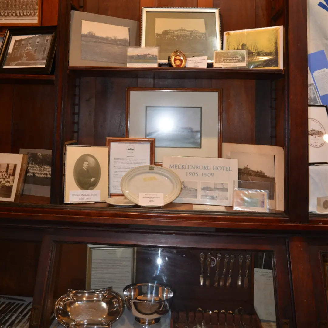 Mecklenburg Hotel exhibit featuring historic photographs and artifacts inside MacCallum More Museum & Gardens in Chase City VA